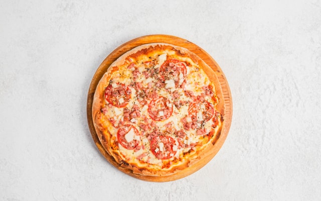 Photo by Alimentos Fotogénicos on Unsplash — representative image for Pizza Hut